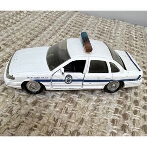 Road Champs Ford Crown Victoria Hartford Police Car 1997 White/Blue Diecast
